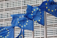 FILE PHOTO: European Union flags flutter outside the EU Commission headquarters in Brussels, Belgium, September 28, 2022. REUTERS/Yves Herman/File Photo