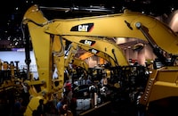 FILE PHOTO: A row of excavators are seen at the Caterpillar booth at the CONEXPO-CON/AGG convention at the Las Vegas Convention Center in Las Vegas, Nevada, U.S. March 9, 2017. REUTERS/David Becker/File Photo