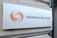 The logo of Thomson Reuters is pictured at the entrance of its Paris headquarters, France, March 7, 2016.