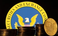 FILE PHOTO: U.S. Securities and Exchange Commission logo and representations of cryptocurrency are seen in this illustration taken June 6, 2023. REUTERS/Dado Ruvic/Illustration/File Photo