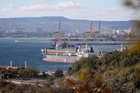 FILE - An oil tanker is moored at the Sheskharis complex, part of Chernomortransneft JSC, a subsidiary of Transneft PJSC, in Novorossiysk, Russia, on Oct. 11, 2022, one of the largest facilities for oil and petroleum products in southern Russia. Russia's oil exports shifted from Europe to China and India due to boycotts by Ukraine's Western allies. (AP Photo, File)