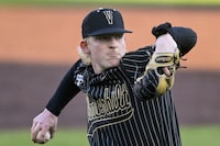 Vanderbilt pitcher Chris McElvain throws against Oklahoma State during an NCAA college baseball game, Feb. 18, 2022, in Nashville, Tenn. The Toronto Blue Jays acquired right-handed pitcher Chris McElvain from the Cincinnati Reds in exchange for infielder Santiago Espinal. THE CANADIAN PRESS/AP, John Amis