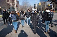 Students walking on St. George St. near the University of Toronto, are photographed on Nov 23, 2022. Fred Lum/The Globe and Mail. 
