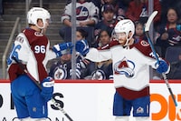Feb 24, 2023; Winnipeg, Manitoba, CAN; Colorado Avalanche left wing J.T. Compher (37) celebrates his first period goal with team mate Colorado Avalanche right wing Mikko Rantanen (96) against the Winnipeg Jets at Canada Life Centre. Mandatory Credit: James Carey Lauder-USA TODAY Sports