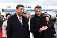 French President Emmanuel Macron welcomes Chinese President Xi Jinping, at the Tarbes airport, France, May 7, 2024. Aurelien Morissard/Pool via REUTERS