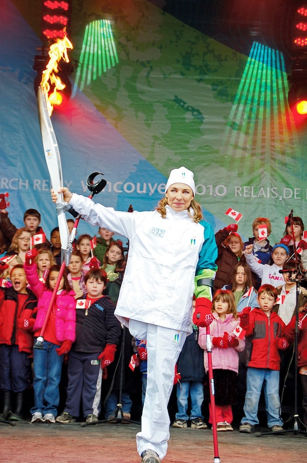 Sarah Doherty walked the final stage of the Sechelt Olympic Torch Relay, then lights the Olympic Cauldron, February 3rd, 2010. Photo by Ian Jacques.
