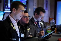 Traders work on the floor at the New York Stock Exchange (NYSE) in New York City, U.S., December 7, 2023.  REUTERS/Brendan McDermid