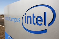 FILE PHOTO: The logo for the Intel Corporation is seen on a sign outside the Fab 42 microprocessor manufacturing site in Chandler, Arizona, U.S., October 2, 2020. REUTERS/Nathan Frandino/File Photo