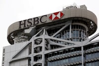 FILE PHOTO: A logo of HSBC is seen on its headquarters at the financial Central district in Hong Kong, China August 4, 2020. REUTERS/Tyrone Siu//File Photo/File Photo