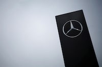 FILE PHOTO: The logo of Mercedes-Benz is seen outside a Mercedes-Benz car dealer in Reze near Nantes, France, March 27, 2024. REUTERS/Stephane Mahe/File Photo