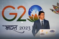 (FILES) Canada's Prime Minister Justin Trudeau attends a press conference after the closing session of the G20 summit in New Delhi on September 10, 2023. Canada on September 18, 2023, accused India's government of involvement in the killing of a Canadian Sikh leader near Vancouver last June, and expelled New Delhi's intelligence chief in Ottawa in retaliation. The diplomatic move sent relations between Ottawa and New Delhi, already sour, to a dramatic new low. Prime Minister Justin Trudeau told an emergency session of the parliamentary opposition at mid-afternoon that his government had "credible allegations" linking Indian agents to the slaying of an exiled Sikh leader, Hardeep Singh Nijjar, in June in British Columbia. (Photo by Money SHARMA / AFP) (Photo by MONEY SHARMA/AFP via Getty Images)