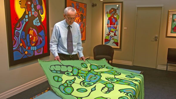 THERE ARE NO FAKES (Documentary, 2018). Pictured: The painting -- Spirit Energy of Mother Earth. After spending $20,000 at a reputable Toronto gallery to purchase Spirit Energy of Mother Earth, Kevin Hearn (of the Barenaked Ladies) was surprised to discover the authenticity of his Morrisseau canvas being called into question. His decision to sue the art dealer spurs an investigation into the painting's provenance, and so begins the unravelling of an art fraud ring with fighting factions, all claiming to be the true protectors of the Anishinaabe painter's legacy—and all of whom happen to be white.  Credit: Cave 7 Productions Inc.