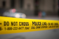 One person is dead and six others are in hospital due to a gas leak in Kitchener, Ont.&nbsp;Police tape is shown in Toronto on Tuesday, May 2, 2017. THE CANADIAN PRESS/Graeme Roy