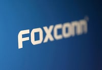 FILE PHOTO: Foxconn logo is seen in this illustration taken, May 2, 2023. REUTERS/Dado Ruvic/Illustration/File Photo