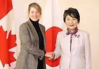 Japan's Foreign Minister Yoko Kamikawa (R) shakes hands with Canada's Foreign Minister Melanie Joly prior to their talks at Kamikawa's office in Tokyo on November 7, 2023, ahead of the G7 foreign ministers' meeting. (Photo by YOSHIKAZU TSUNO / POOL / AFP) (Photo by YOSHIKAZU TSUNO/POOL/AFP via Getty Images)