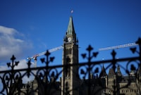 The Peace Tower of Parliament Hill is shown in Ottawa in late 2023. The Uyghur Rights Advocacy Project wrote to Justice Hogue Wednesday to serve notice it is formally withdrawing because she granted party standing to former Ontario Liberal cabinet minister Michael Chan, now deputy mayor of Markham, Ont., and independent MP Han Dong.