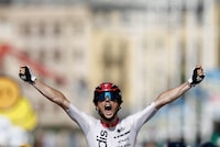 Cycling - Tour de France - Stage 2 - Vitoria Gasteiz to San Sebastian - Spain - July 2, 2023 Cofidis' Victor Lafay celebrates as he crosses the finish line to win stage 2 REUTERS/Benoit Tessier