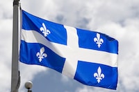 A Quebec coroner is asking the province's ski industry to review its training and safety practices after a six-year-old girl died after being dragged by a T-bar lift during a ski lesson in January. A&nbsp;provincial flag flies in Ottawa, Friday July 3, 2020. THE CANADIAN PRESS/Adrian Wyld