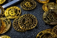 Bitcoin coins are seen at a stand during the Bitcoin Conference 2023, in Miami Beach, Florida, U.S., May 19, 2023.