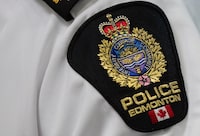 An Edmonton Police Service shoulder badge is shown in Edmonton on Aug. 1, 2023. THE CANADIAN PRESS/Jason Franson.