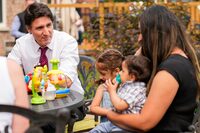 Prime Minister Justin Trudeau speaks with Kujlit Dhinsa as he meets with parents ahead of a child care funding announcement in Mississauga, Ont., Wednesday, June 28, 2023. THE CANADIAN PRESS/Andrew Lahodynskyj