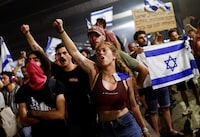 Protesters block Ayalon Highway during a demonstration following a parliament vote on a contested bill that limits Supreme Court powers to void some government decisions, in Tel Aviv, Israel July 25, 2023. REUTERS/Corinna Kern