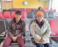 From left, Elisapee Ishulutak and Ina Ishulutak at the Iqaluit airport before Elisapee took Ina to a respite care bed in Arviat, another Nunavut community. The stay is supposed to be temporary and they hope she’ll be back in Iqaluit soon.