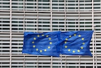 FILE PHOTO: European flags fly outside the European Commission headquarters in Brussels, Belgium March 13, 2023. REUTERS/Yves Herman/File Photo