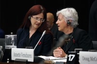 Sustainable Development Technology Canada CEO Leah Lawrence (L) chats with board chair Annette Verschuren  before the Standing Committee on Access to Information, Privacy and Ethics November 8, 2023 on Parliament Hill in Ottawa.  Dave Chan/The Globe and Mail