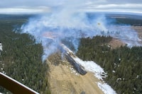 A wildfire burns near Edson, Alta. in this Tuesday, April 16, 2024, handout photo. A natural gas pipeline owned by TC Energy Corp. ruptured near Edson, Alta. on Tuesday afternoon, sparking a wildfire. THE CANADIAN PRESS/HO, Alberta Wildfire *MANDATORY CREDIT*