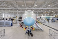 Airplanes in production on the factory floor as Canadian business jet maker Bombardier holds an investor day at their plant in Mississauga, Ontario on May 1.