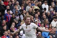 Manchester City's Kevin De Bruyne celebrates after scoring his side's fourth goal during the English Premier League soccer match between Crystal Palace and Manchester City at Selhurst Park stadium in London, Saturday, April 6, 2024.(AP Photo/Frank Augstein)