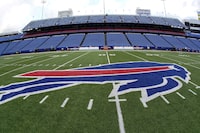 FILE - The Buffalo Bills logo is displayed opn the field at Highmark Stadium before an NFL football game between the Pittsburgh Steelers and the Buffalo Bills in Orchard Park, N.Y., Sunday, Oct. 9, 2022. The Bills' wild-card playoff game against the Pittsburgh Steelers that was scheduled for Sunday, Jan. 14, 2024, was moved to Monday amid a forecast for dangerous winter weather, New York Gov. Kathy Hochul announced Saturday. (AP Photo/Gene J. Puskar, File)