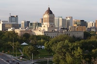 The Manitoba Legislature in Winnipeg, Saturday, August 30, 2014. Manitoba's NDP government is lifting a ban on project labour agreements enacted by the former Progressive Conservative government. THE CANADIAN PRESS/John Woods
