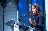 Premier Danielle Smith says Alberta will continue its $7.5-million pension-exit advertising and survey campaign despite acknowledging the key dollar figure is disputed and likely headed to court. Smith gives the state of the province address in Edmonton, Wednesday, Oct. 25, 2023. THE CANADIAN PRESS/Jason Franson