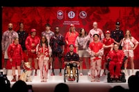 Team Canada athletes pose for a photo at the reveal of Lululemon Athletica's Team Canada uniforms for the Paris 2024 Olympics, in Toronto, Canada, April 16, 2024.  REUTERS/Carlos Osorio