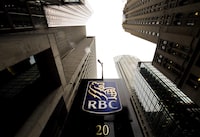 A Royal Bank of Canada sign is shown in the financial district in Toronto on August 22, 2017. A new poll by RBC found that Canadians aged 18 to 34 are much less confident today about their financial future than they were a year ago.THE CANADIAN PRESS/Nathan Denette