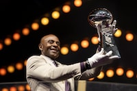 Former San Francisco 49ers wide Receiver Jerry Rice raises the Vince Lombardi Trophy during Super Bowl Experience opening ceremony, Wednesday, Feb. 7, 2024, in Las Vegas. (Kyusung Gong/AP Images for NFL)