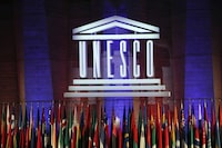 FILE - The logo of the United Nations Educational, Scientific and Cultural Organisation (UNESCO) is seen during the 39th session of the General Conference at the UNESCO headquarters in Paris, Saturday, Nov. 4, 2017. UNESCO's 193 members states are gathering Thursday June 29, 2023 for a two-day meeting in Paris aimed at voting on the United States' plans to rejoin the U.N. cultural and scientific agency, after a decade-long dispute sparked by the organization's move to include Palestine as a member. (AP Photo/Christophe Ena, File)