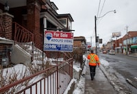 A house is listed for sale on Dufferin Street in Toronto on February 16, 2024 (Laura Proctor/The Globe and Mail)
