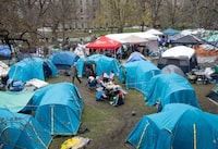 Pro-Palestinian activists at their encampment on the McGill University campus, in Montreal, Wednesday, May 1, 2024. THE CANADIAN PRESS/Ryan Remiorz