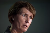 B.C. Representative for Children and Youth Mary Ellen Turpel-Lafond speaks during a news conference after releasing a joint report with the B.C. Information and Privacy Commissioner about cyberbullying, in Vancouver, B.C., on Friday November 13, 2015. The University of Regina says it has rescinded the honorary doctor of laws degree it awarded to Turpel-Lafond in 2003 as she faces questions about her Indigenous heritage. THE CANADIAN PRESS/Darryl Dyck