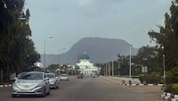 <div>Nigerian officials say there have been deaths after a fire at Canada's high commission in Abuja. Cars drive past the National Assembly building in Abuja, Nigeria, Thursday, Nov. 2, 2023. THE CANADIAN PRESS/AP-Chinedu Asadu</div>
