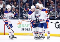 LOS ANGELES, CALIFORNIA - APRIL 28:  Ryan Nugent-Hopkins #93, Zach Hyman #18, Leon Draisaitl #29 and Evan Bouchard #2 of the Edmonton Oilers celebrate a power play goal against the Los Angeles Kings in the second period during Game Four of the First Round of the 2024 Stanley Cup Playoffs at Crypto.com Arena on April 28, 2024 in Los Angeles, California. (Photo by Ronald Martinez/Getty Images)