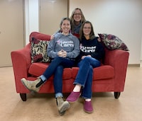 Deirdre Connolly, left; Stacey Hoffe, centre; and Petrina Beals with the Newfoundland and Labrador Sexual Assault Crisis and Prevention Centre, the Mokami Status of Women Council, and Violence Prevention Labrador, on Saturday May 13 2023. The organizations are pooling resources to launch a counselling centre in Happy Valley-Goose Bay, N.L., for those affected by gender-based violence. THE CANADIAN PRESS/Sarah Smellie