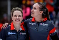 Team Ontario-Homan skip Rachel Homan, right, celebrates with vice-skip Tracy Fleury after defeating Team Manitoba-Jones in the final at the Scotties Tournament of Hearts in Calgary, Sunday, Feb. 25, 2024.  THE CANADIAN PRESS/Jeff McIntosh