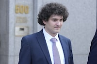 FILE - FTX founder Sam Bankman-Fried leaves Federal court, Wednesday, July 26, 2023, in New York. Prosecutors asked a New York judge on Friday, March 15, 2024 to sentence FTX founder Sam Bankman-Fried to between 40 and 50 years in prison for cryptocurrency crimes they described as a “historic fraud.”(AP Photo/Mary Altaffer)