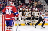 Apr 13, 2023; Montreal, Quebec, CAN;Boston Bruins forward David Pastrnak (88) celebrates with teammates after scoring a goal against Montreal Canadiens goalie Sam Montembeault (35) during the third period at the Bell Centre. Mandatory Credit: Eric Bolte-USA TODAY Sports