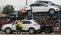 OAKVILLE, OCT 13, 2017 - NFTA CARS - Workers at the Oakville Ford plant load cars onto a truck for shipment to unknown destinations on Friday October 13, 2017. Glenn Lowson photo/The Globe and Mail