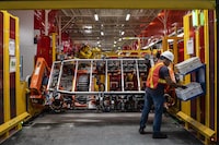 Components of electric vehicle battery trays are welded at Magna's Heart Lake production facility, where they are currently manufacturing battery enclosures for Ford F-150s, in Brampton, Ont., Thursday Aug. 3, 2023. (Christopher Katsarov/The Globe and Mail)
